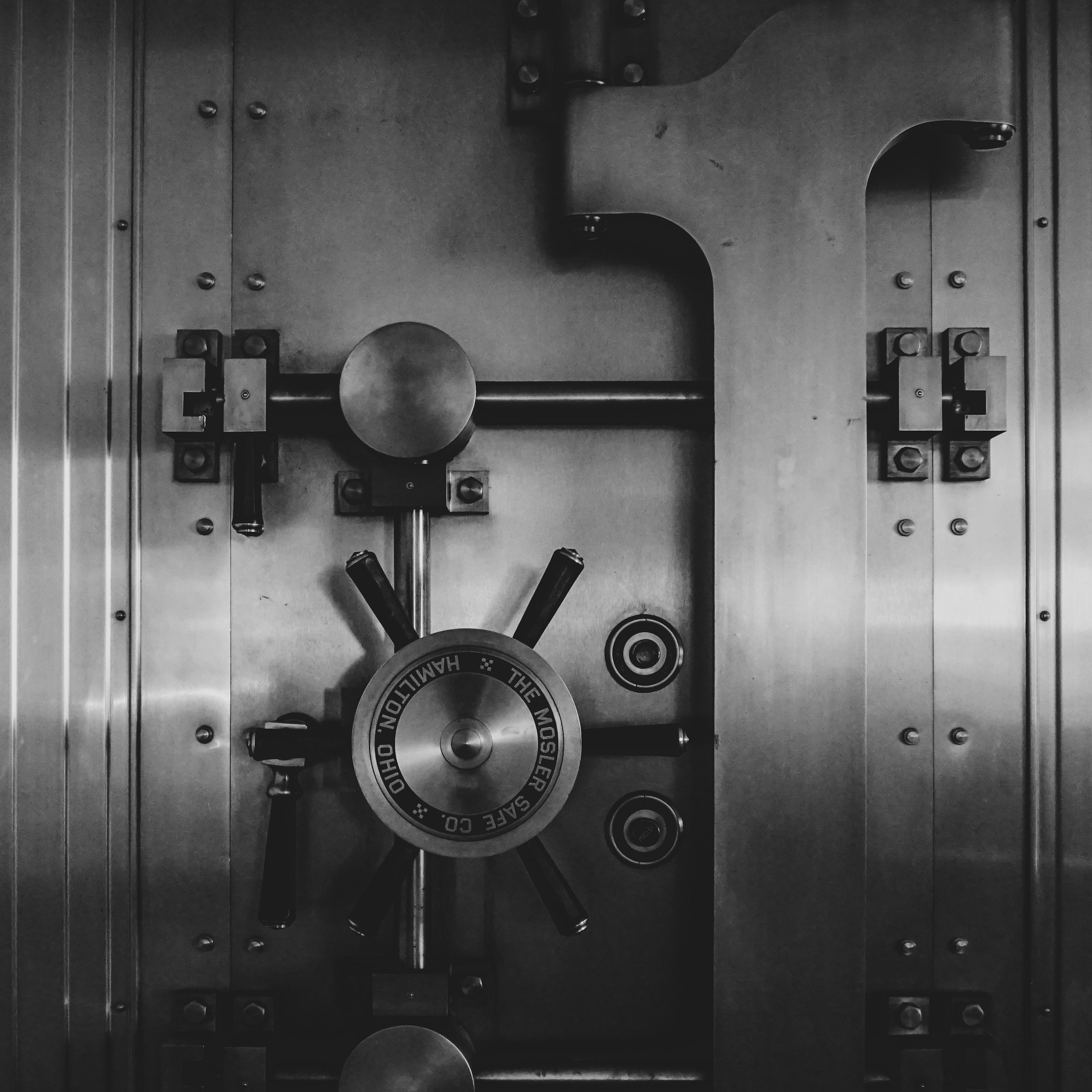 A traditional metal vault door.